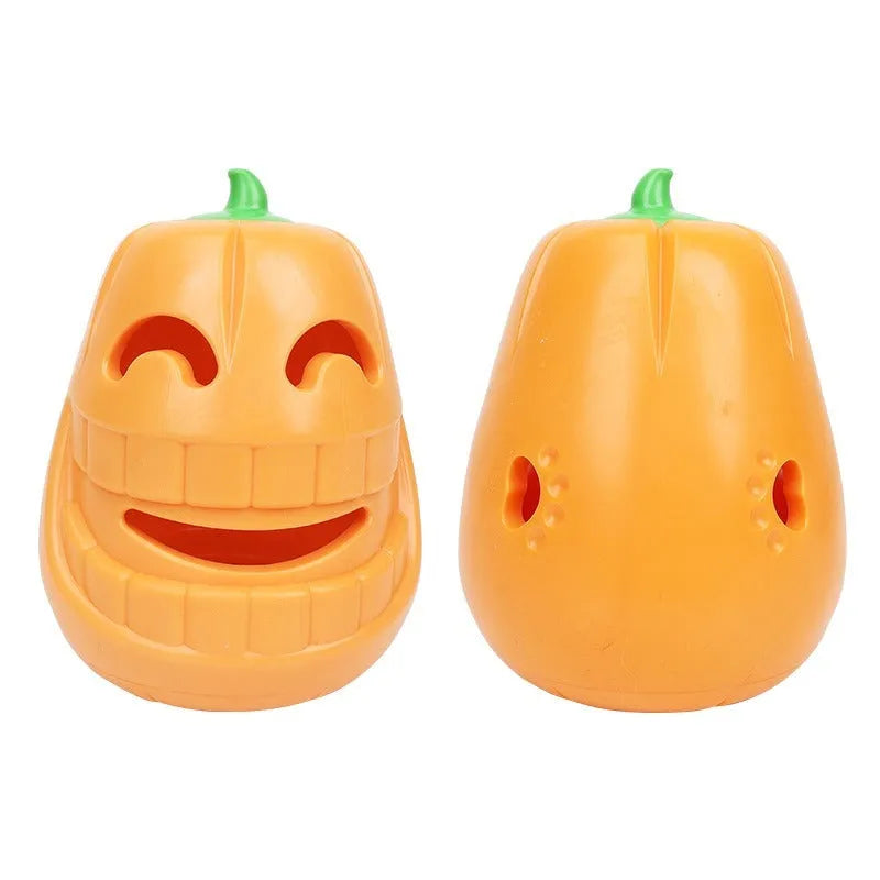 Orange Halloween pumpkin shaped interactive dog chew toy with a treat-dispensing funnel.