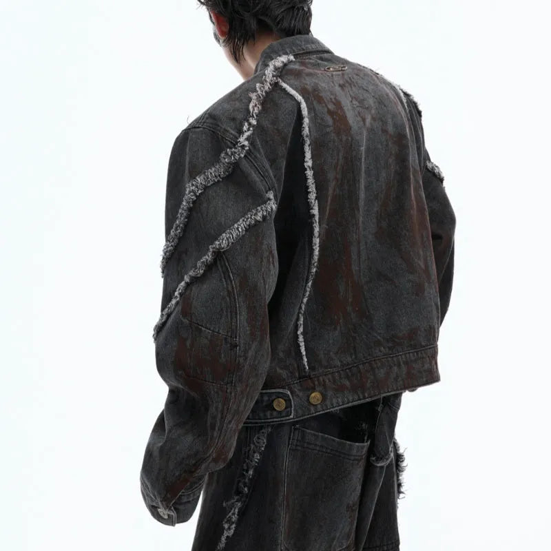 Loose fit distressed denim coat with splash-dye gradient pattern and matching black trousers