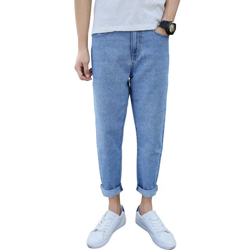 Men's black straight leg harem jeans with college-inspired styling on hanger