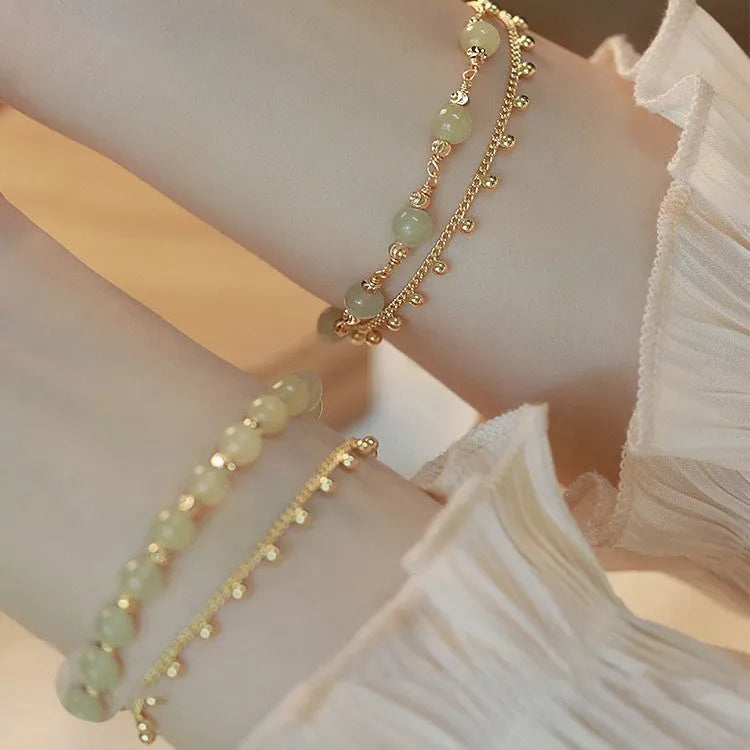 Natural Hetian jade beaded bracelet in classic princess running style for women.