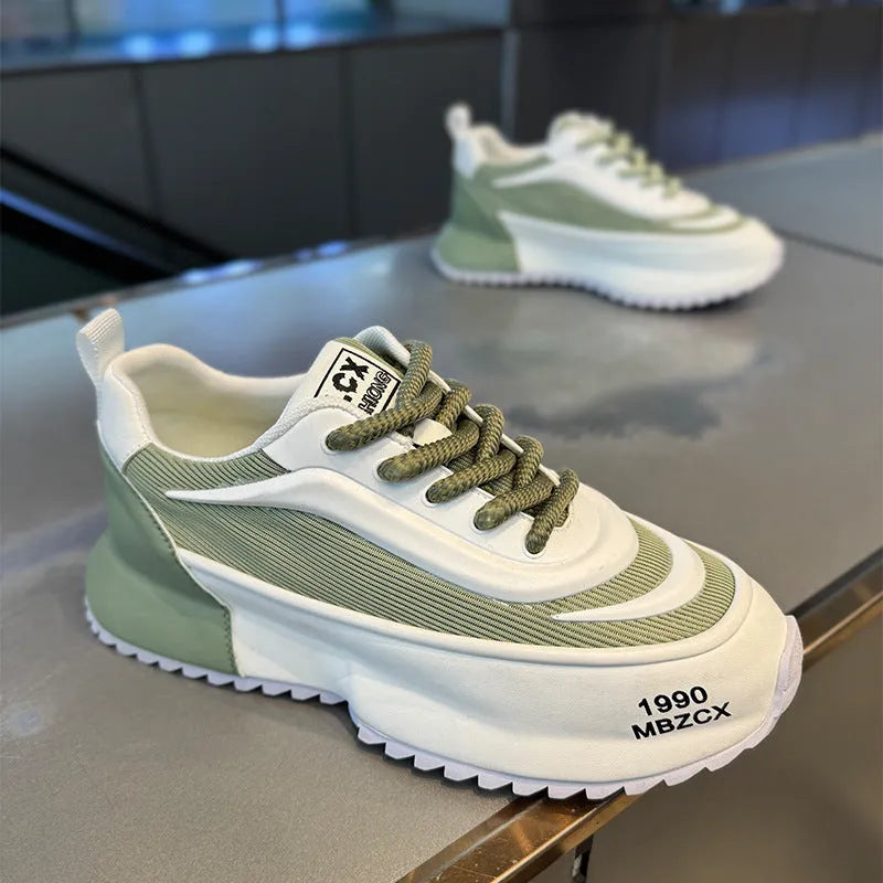Youth Argan running sneaker with thick sole and mesh upper in white and green colour