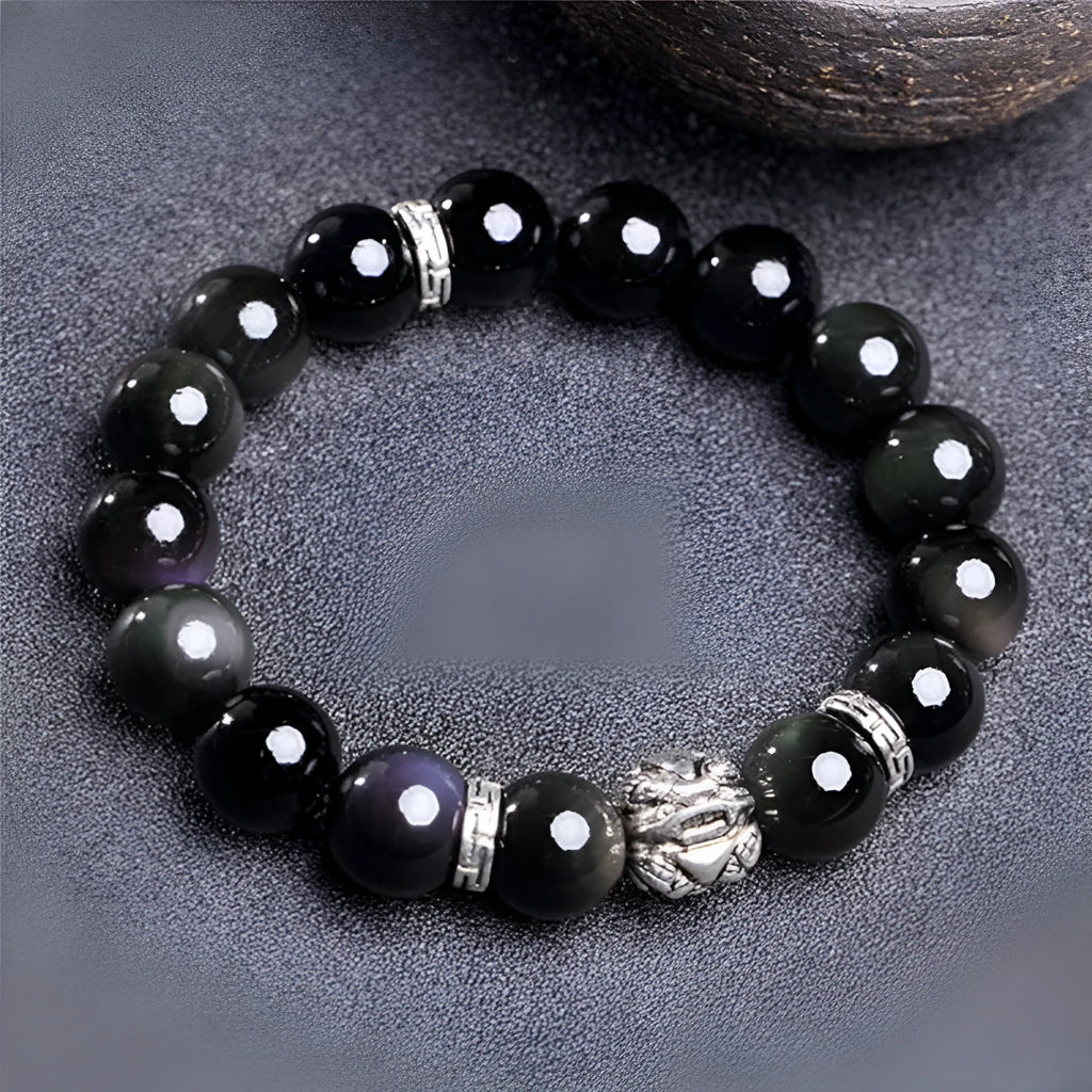 Natural obsidian bracelet with silver 999 clasp, showing cloud year pattern and lucky colour eye beads.
