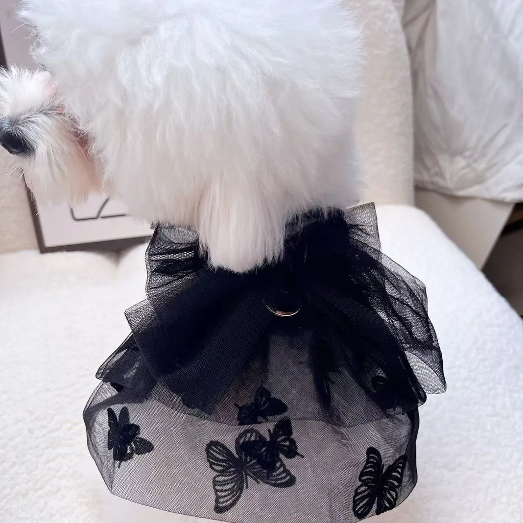 Black tulle princess skirt costume for a small dog on a mannequin.