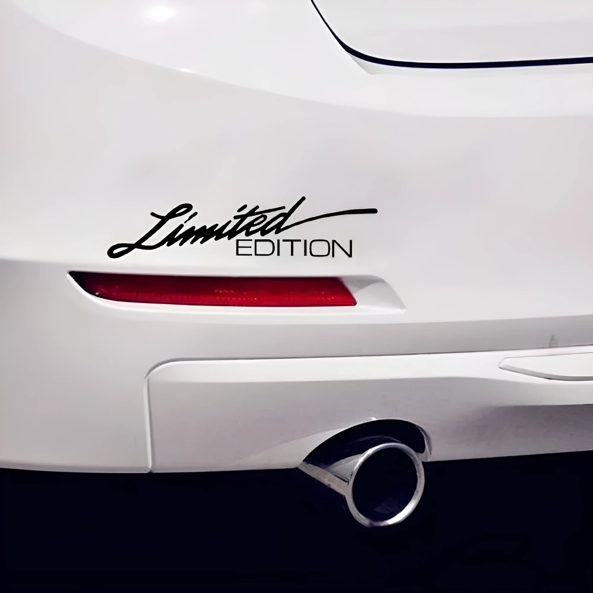 Reflective plastic bumper sticker showing colour options: black, white, and multi-colour, next to a ruler showing 16cm length.