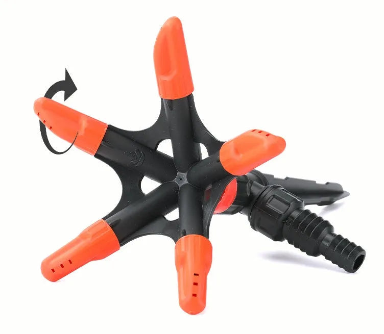 Orange plastic garden insert sprinkler with rotating water spray nozzle, 14x26.5cm