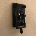 A retro-styled single-gang mechanical light switch plate for American standard exposed installation.