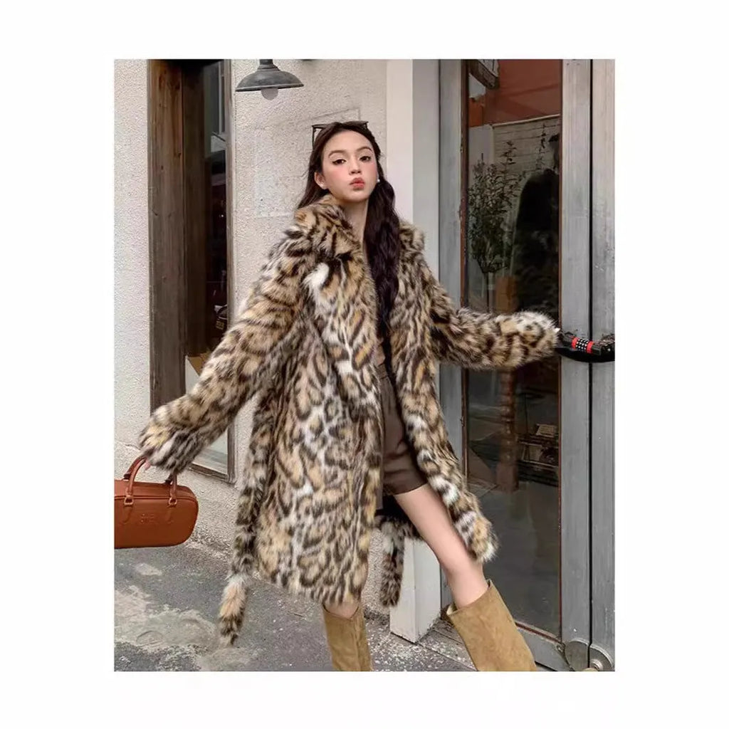 Artificial fox fur coat with fur collar in street fashion style with pockets