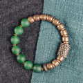 Retro ethnic style couples bracelet with natural green agate beads shown on a wrist.