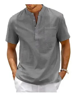 Men's solid colour stand collar short sleeve polo shirt laid flat.