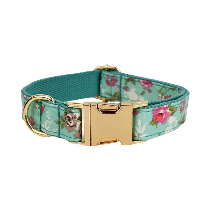 Rose patterned dog collar and leash set with green background, detachable bow, and matching cloth vest.