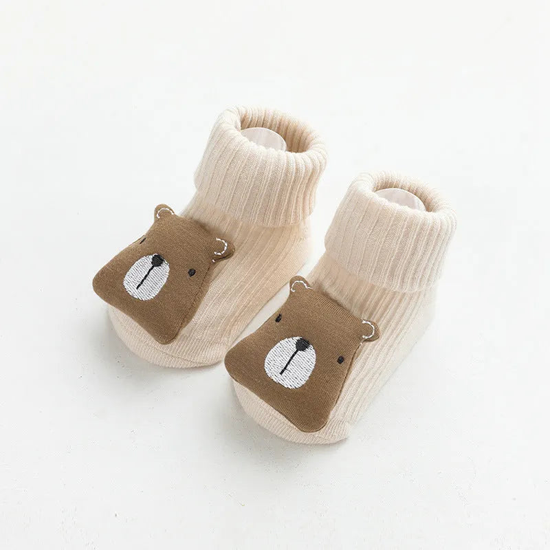 Children's combed cotton non-slip socks in multiple colours for sizes XS, S, and M.