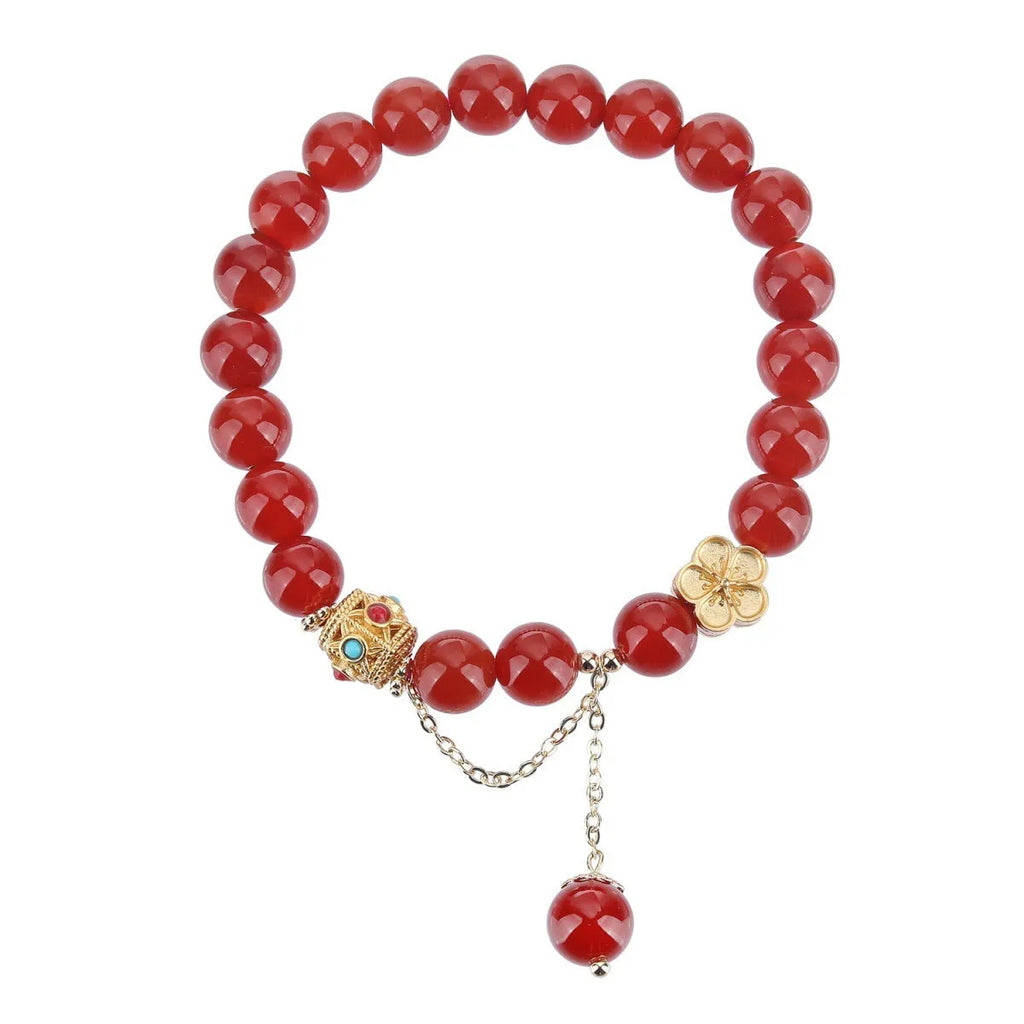 Women's agate bracelet with peach blossom copper parts and approximately 8mm beads in natural red or white stone.