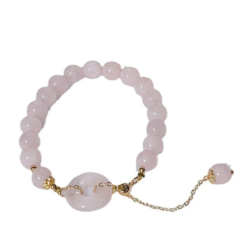 Pink crystal women's bracelet with peace buckle design and adjustable safety buckle closure