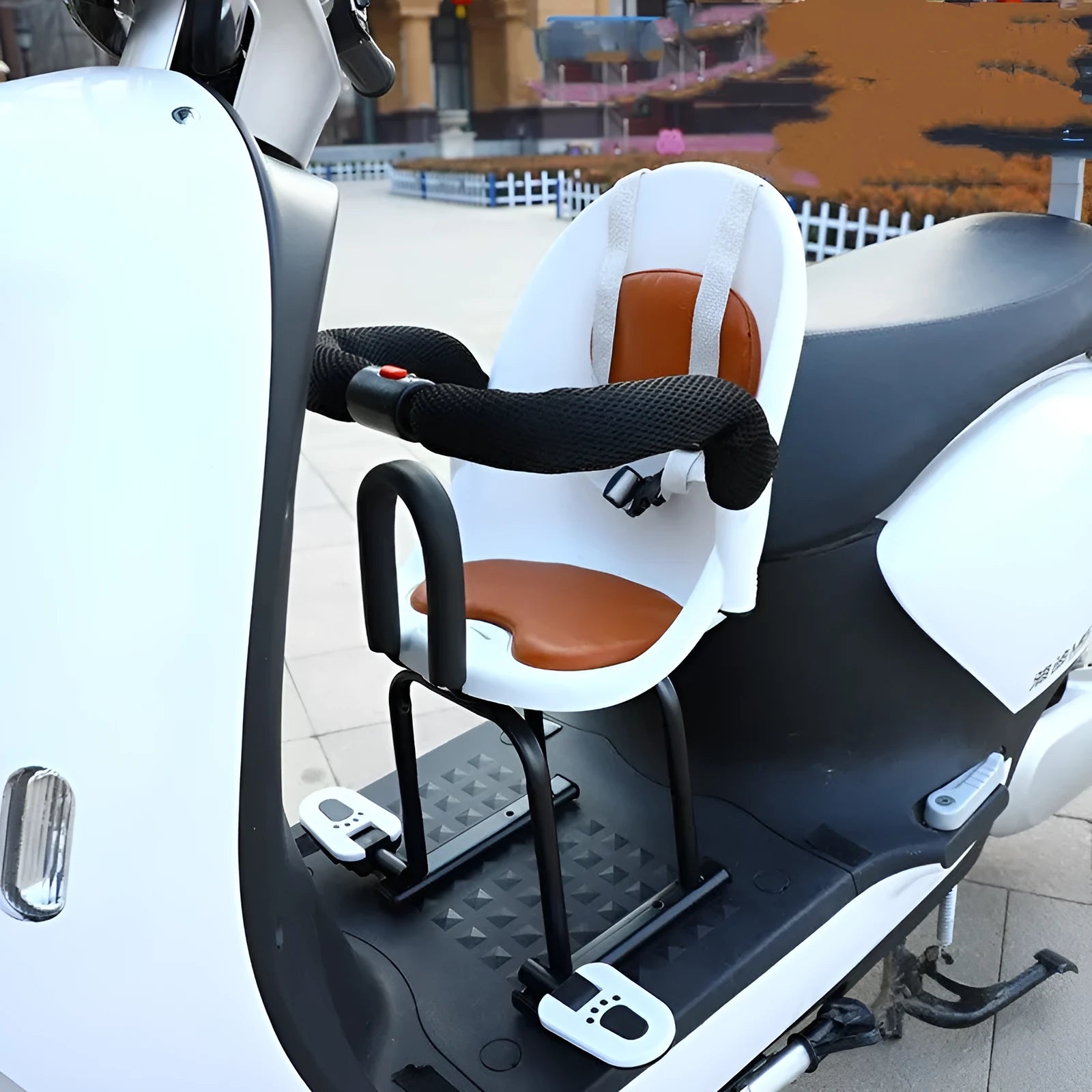 Front child seat for scooters in high carbon steel construction showing white, red and black colour options