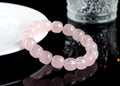 Pink crystal barrel bead bracelet with geometric design, 11-12mm beads, unisex accessory