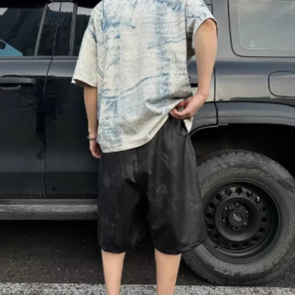 Plain solid colour loose fit t-shirt on a hanger, front view showing round neck and short sleeves.