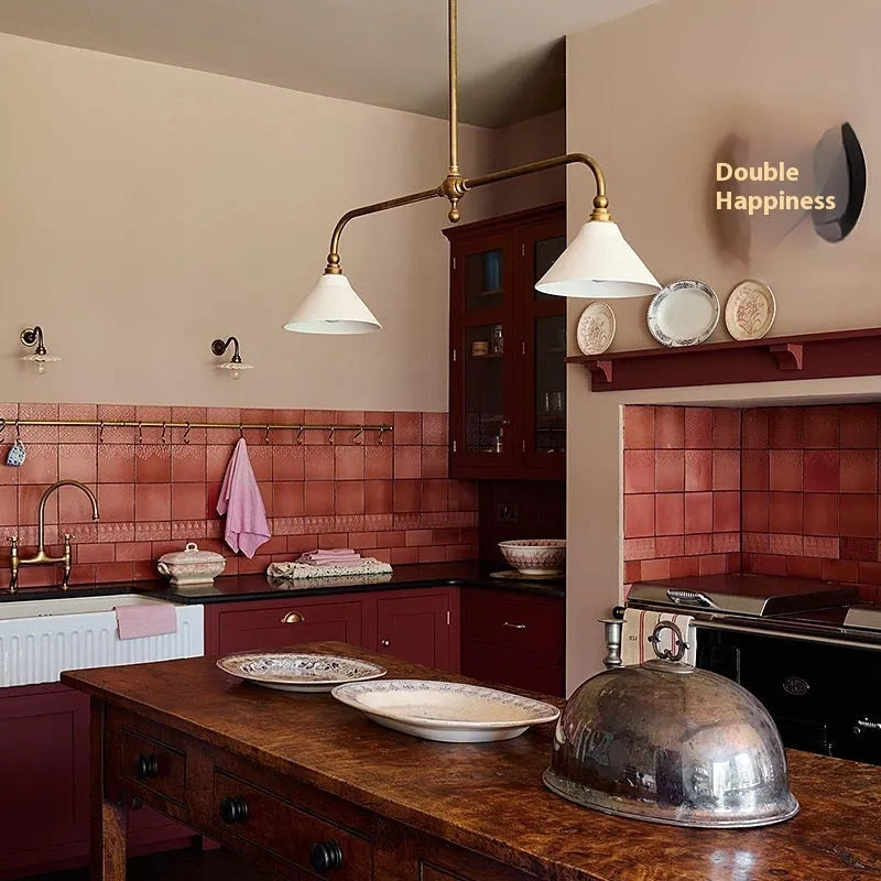 All copper American retro linear chandelier with warm LED light over kitchen island, aluminium lampshade option