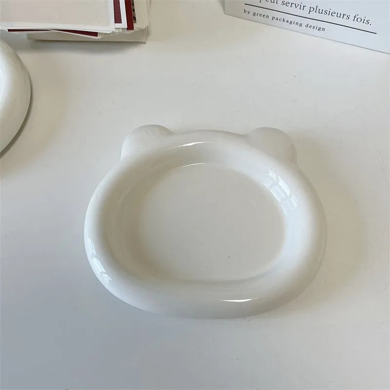 White porcelain plate with bear doodle design, round shape, shown in 15cm and 20cm sizes