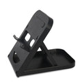 Compact black ABS adjustable game console stand for Switch on desktop