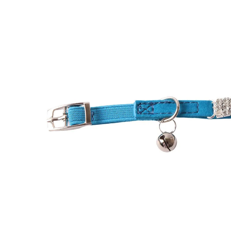 Soft flocking elastic cat collar with a buckle fastener, shown in various colours.