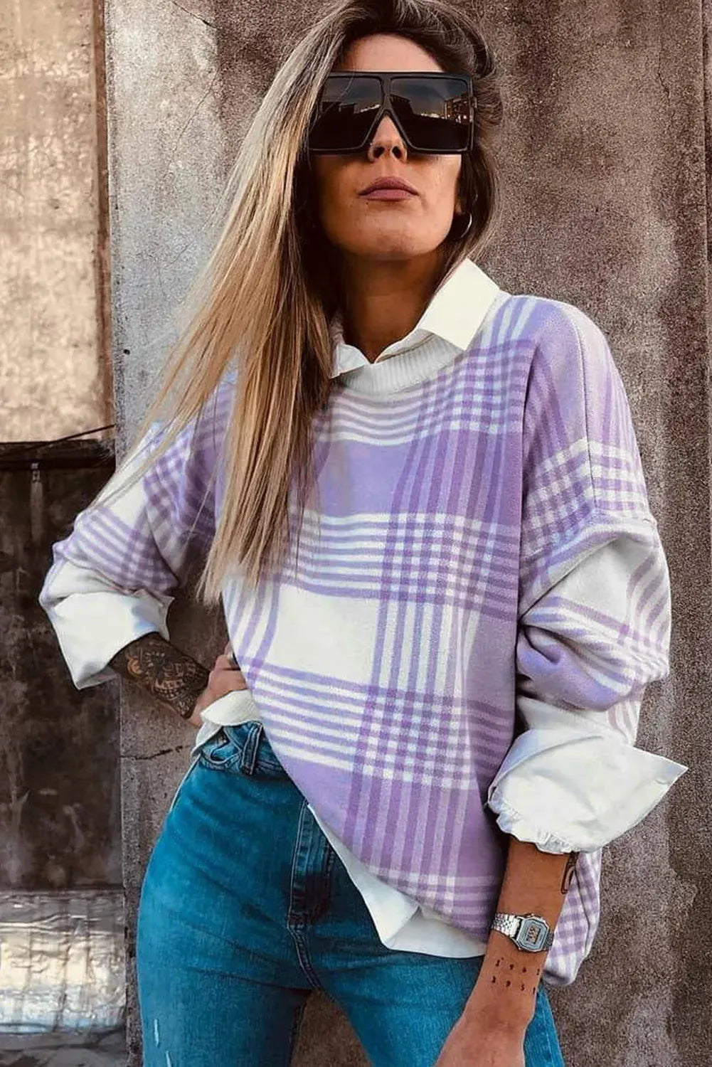 Lilac plaid print loose-fitting women's sweater with long sleeves and ribbed trim.