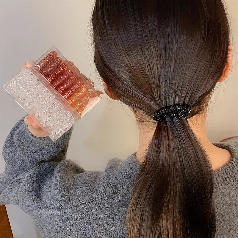 Traceless TPU hair rings in assorted colours on white background