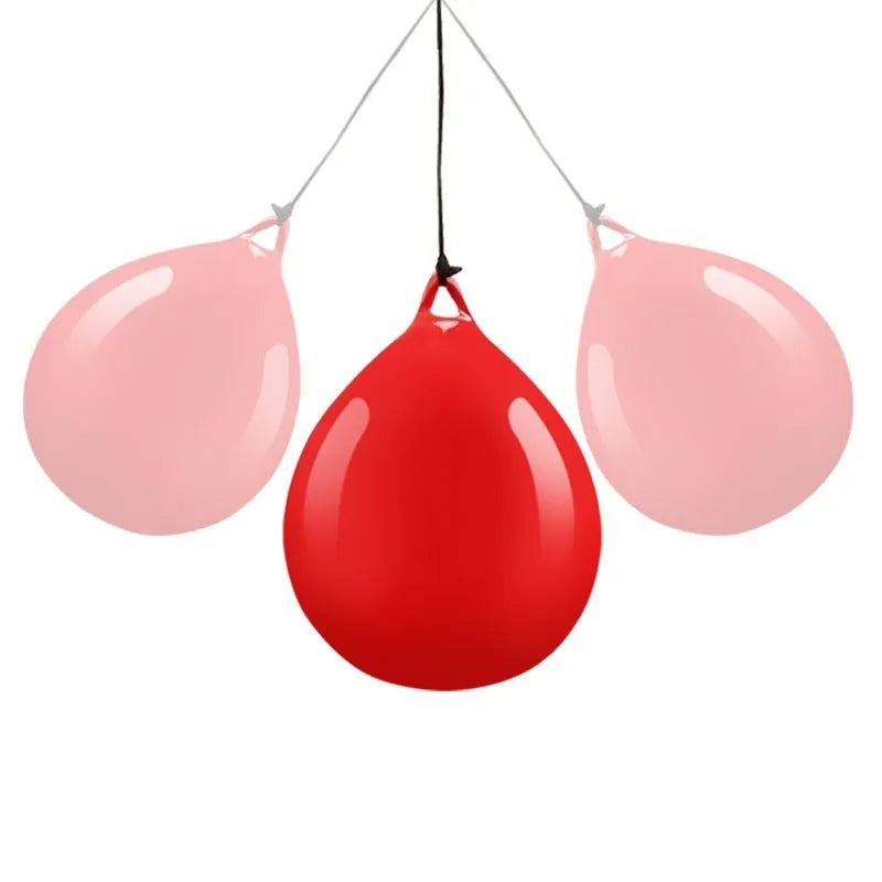 Red water-filled PVC boxing reaction ball with hook rope attachment for martial arts training