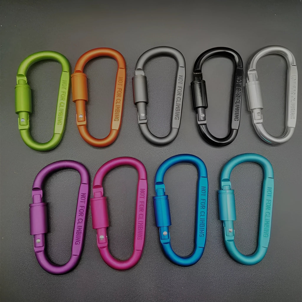 Aluminium D-shaped carabiner with lock in multiple colour options on a grey background.