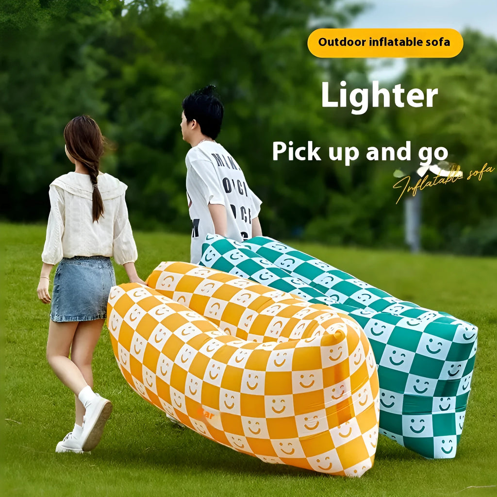 Portable inflatable sofa in folded position showing Oxford cloth material and compact 36cm x 27cm dimensions