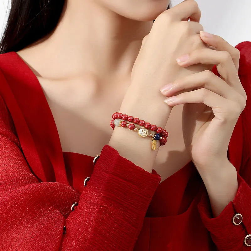 Women's 925 sterling silver bracelet with blessing card, cinnabar charm, white shell accents and engraved characters