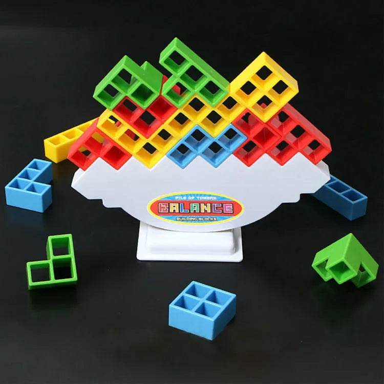 Plastic balance stacking game with colourful blocks on a chassis