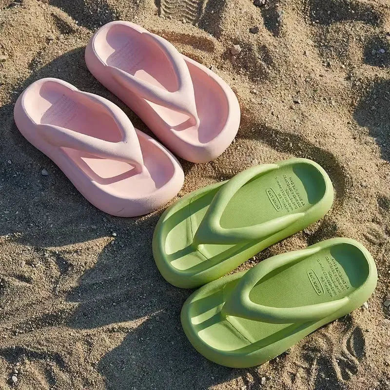 Solid colour EVA thong sandals with a thick sole and a decorative bow on the strap.