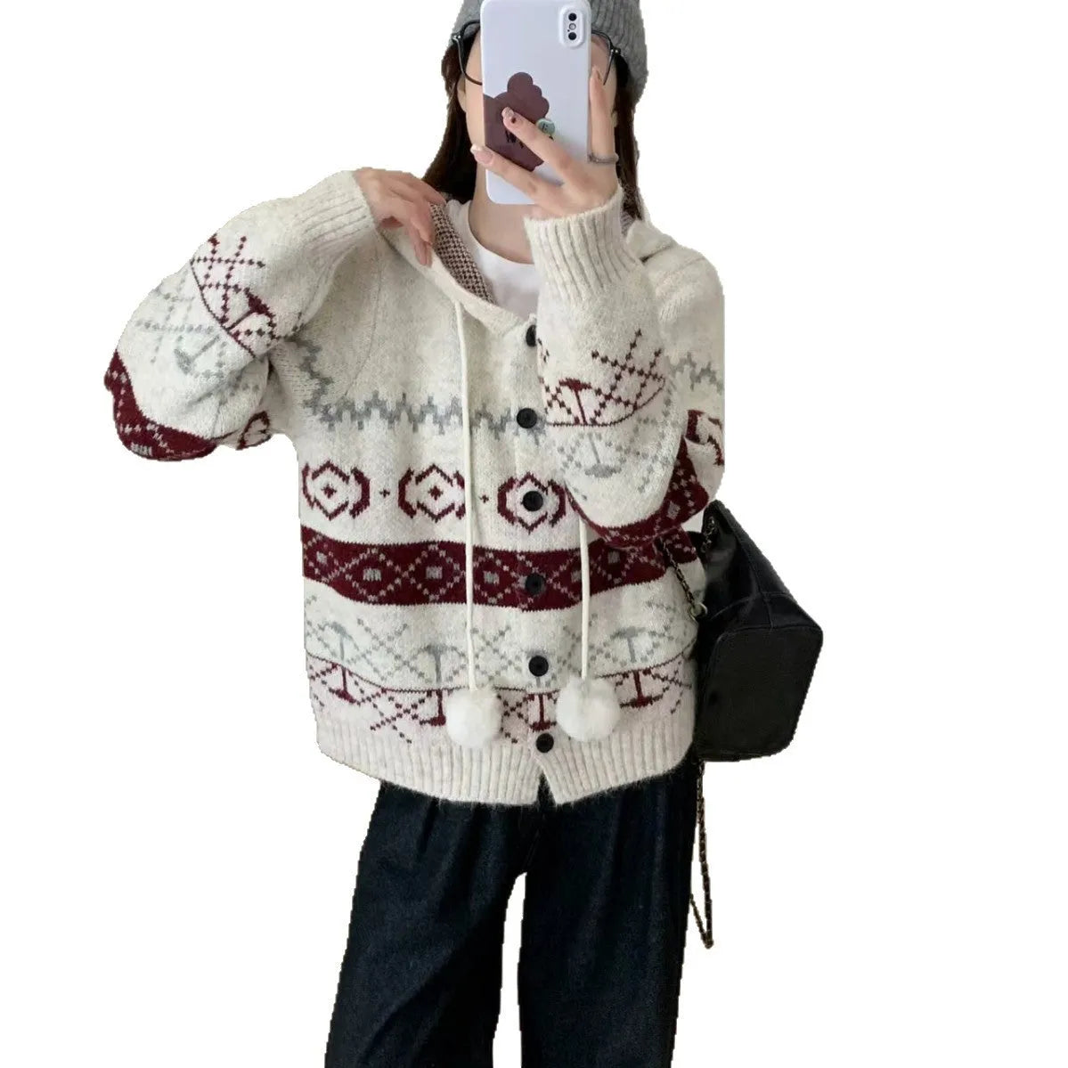 Loose fit grey geometric brocade sweater coat for plus size women on a hanger.