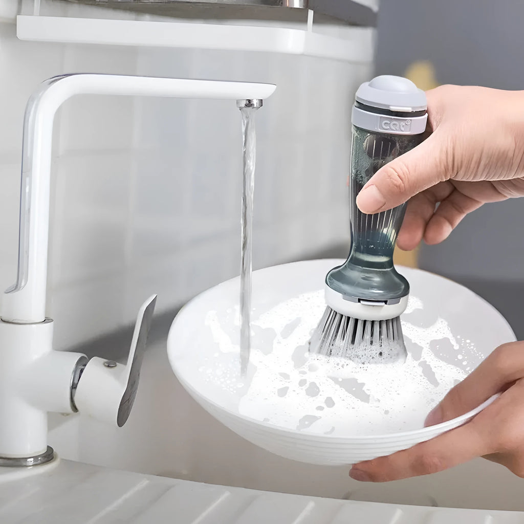 Pot and dish brush with soap dispenser, ergonomic handle, and replaceable brush head in mint green colour