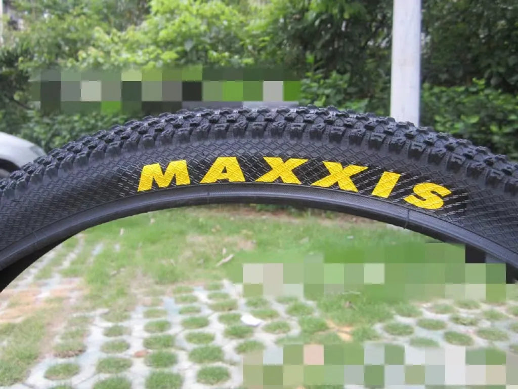 Mountain bike ultralight puncture-proof tyre shown in multiple sizes for 26, 27.5, and 29-inch wheels.