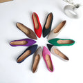 Women's knit flat pumps with pointed toe and rubber sole available in multiple colours