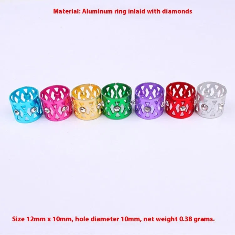 Aluminium hair ring in seven colours with hollow design featuring crown and heart shape decorations
