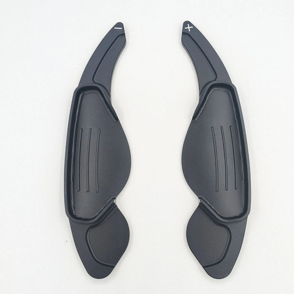 Aluminium alloy steering wheel shift paddles in silver, red, blue, and black for universal car interior modification.