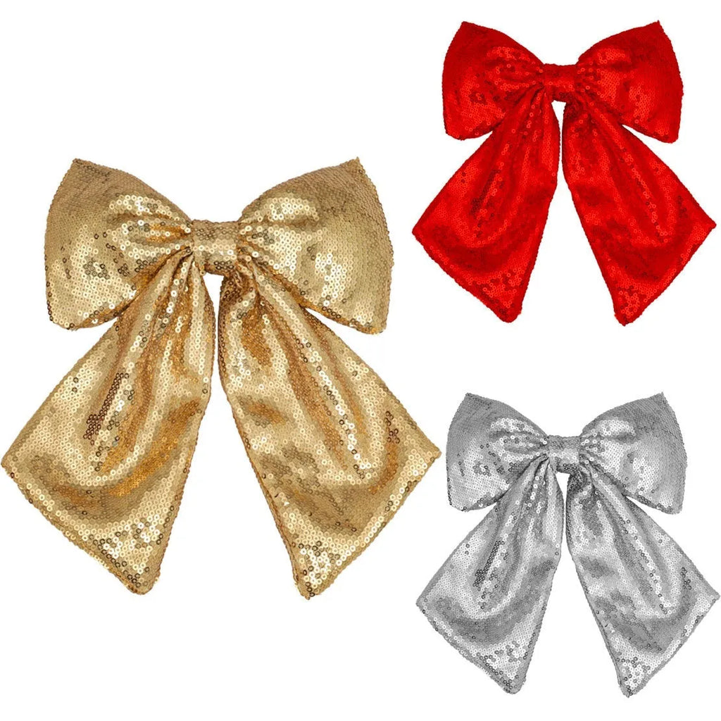 Pearlescent sequined Christmas bow decoration in gold, red, or silver, available in 20X25, 25X30, and 35X40 sizes.