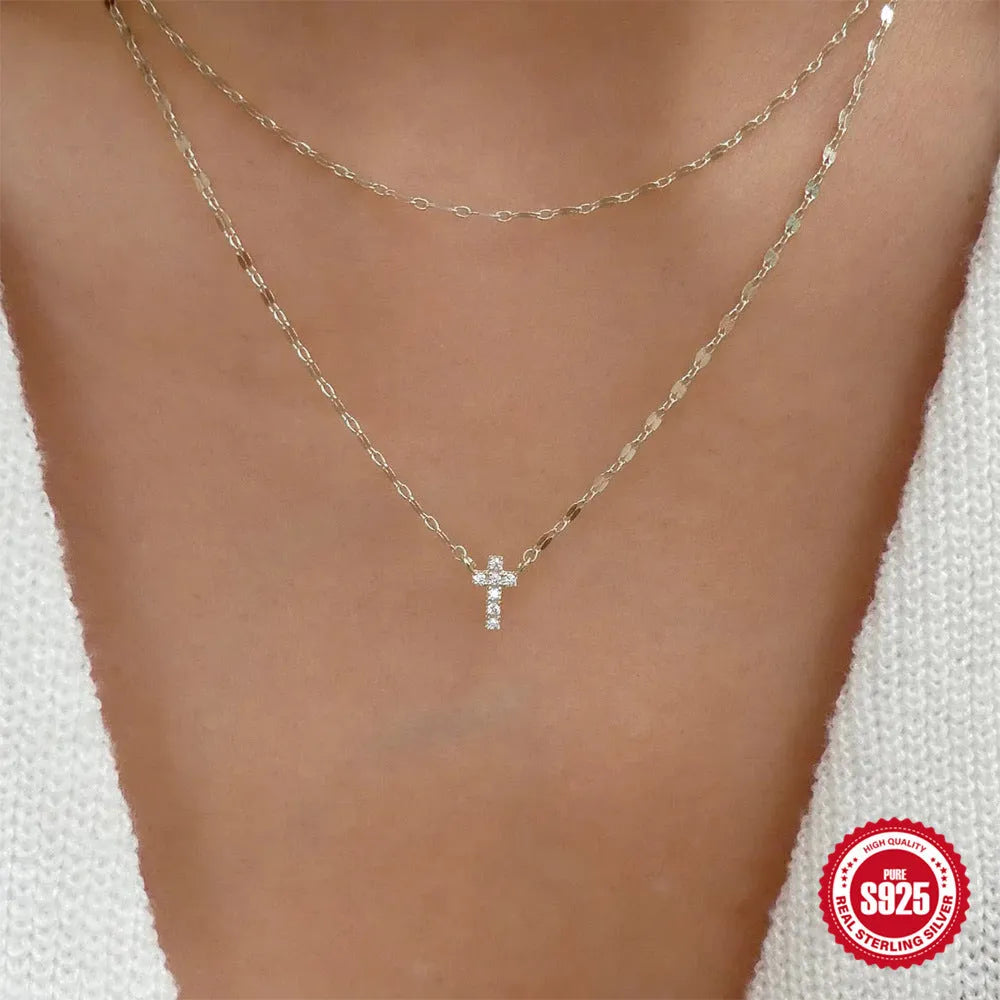 S925 sterling silver double-layer cross pendant necklace with twin diamonds on a clavicle chain.