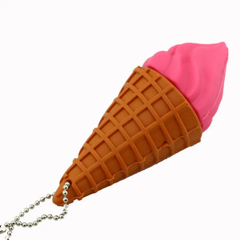 Mini ice cream shaped USB flash drive in pink colour on a white background.