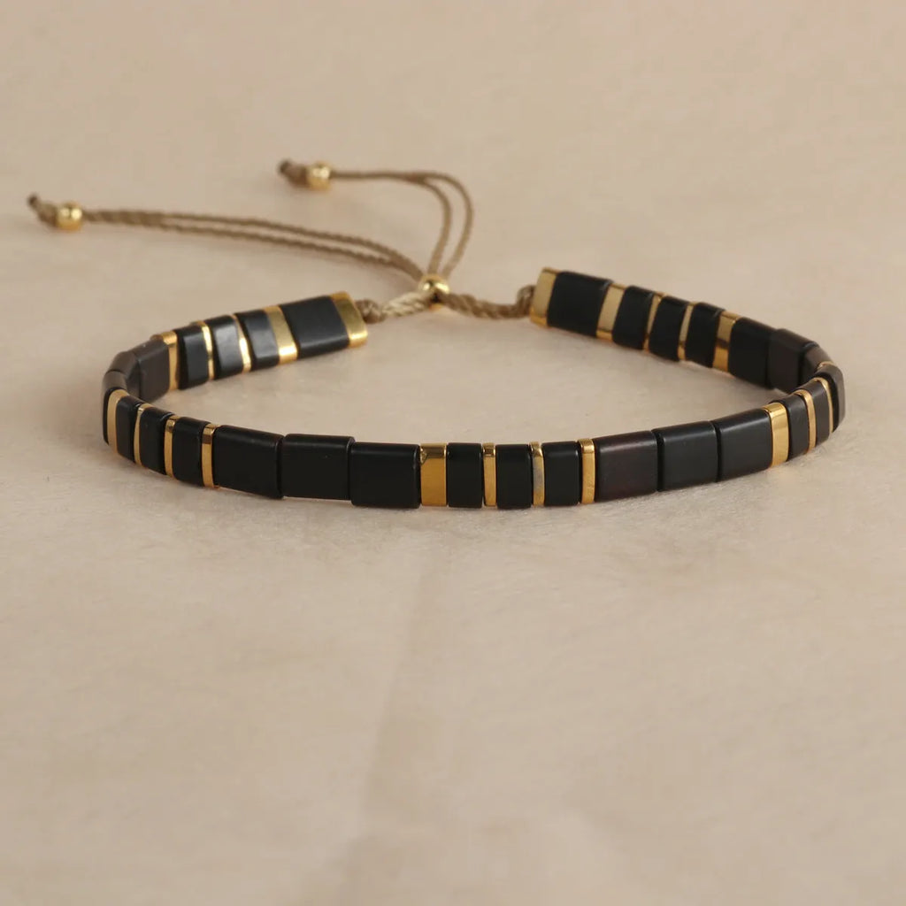 Geometric pull bead bracelet with round glass beads in five colour options