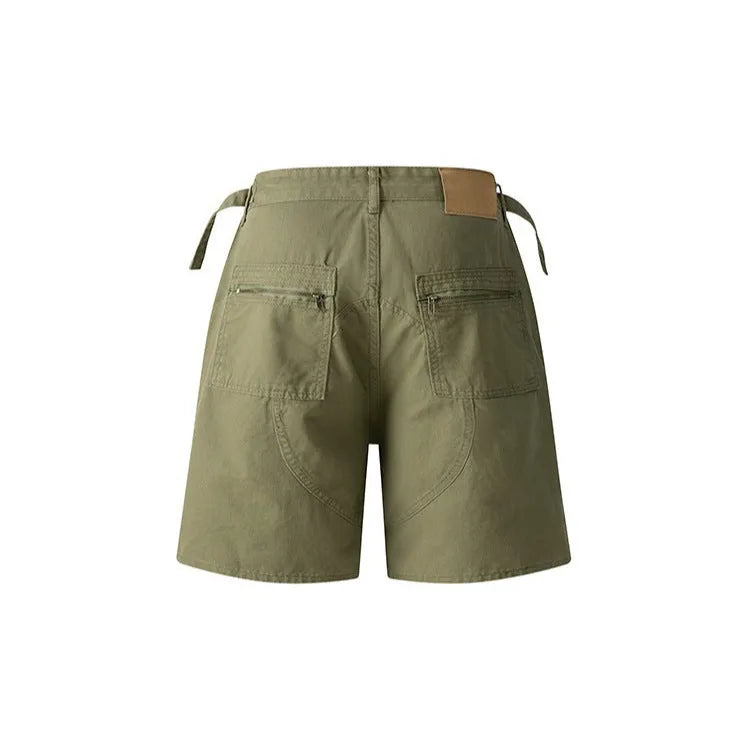 Grey loose-fit retro washed cotton shorts with elasticated waistband on a hanger.
