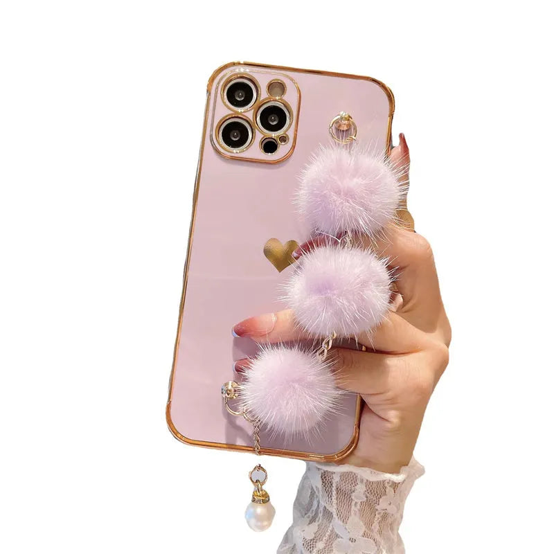 Plush bracelet iPhone case with side love design and holder in black, pink, purple, or white.