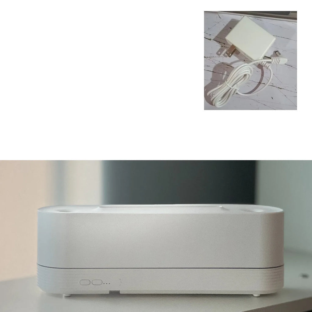 Black ultrasonic aromatherapy diffuser with LED flame lights emitting cool mist vapour
