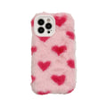 Pink silicone iPhone case featuring a Love Plush cartoon design on the back.