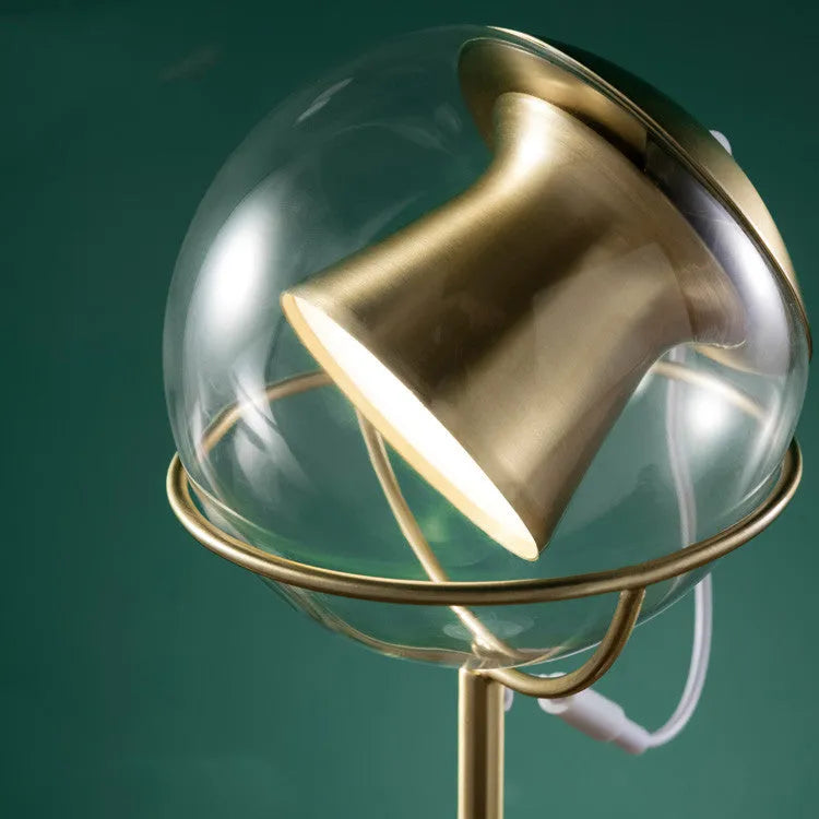 Glass lampshade desk lamp with dimmable LED light and touch switch.