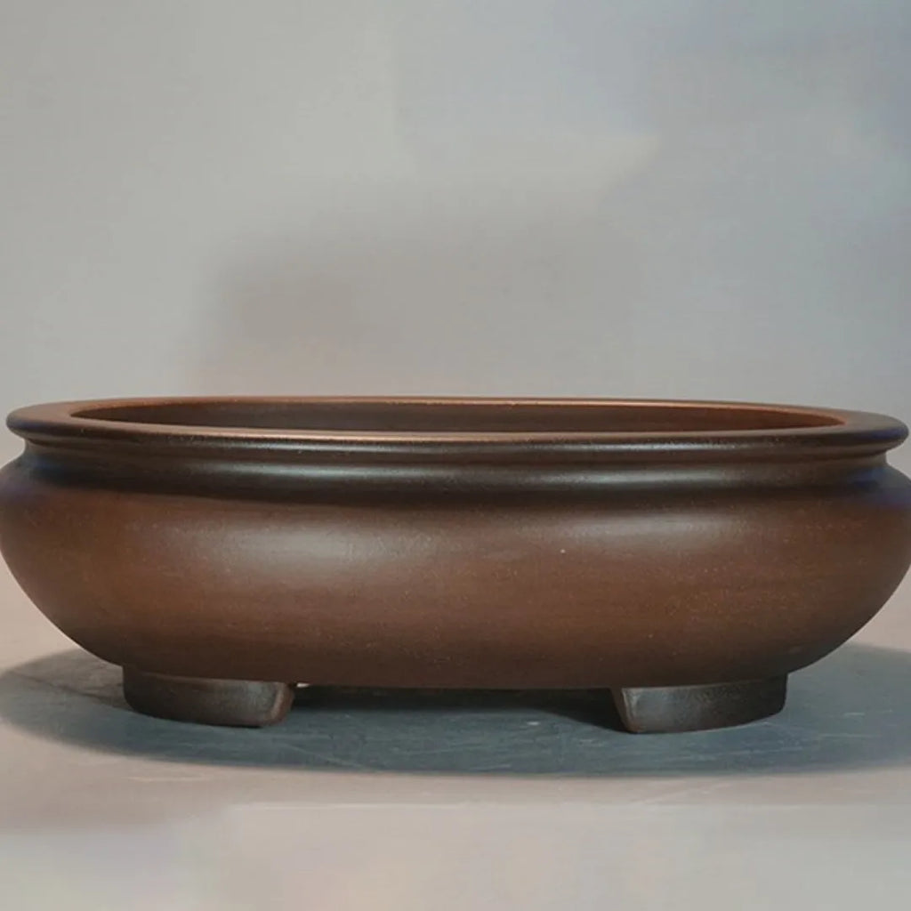 Handmade classical purple clay desktop flowerpot measuring 58 cm wide by 47 cm high.