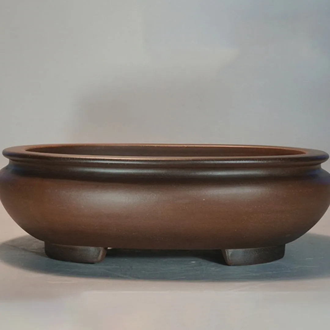 Handmade classical purple clay desktop flowerpot measuring 58 cm wide by 47 cm high.
