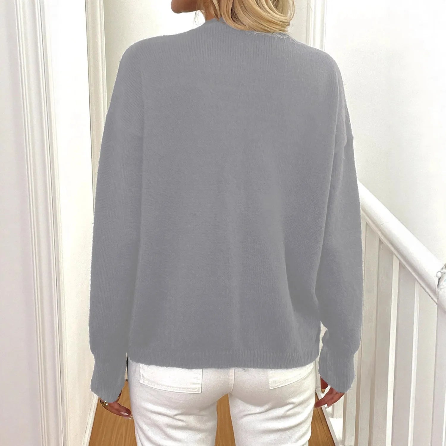 A woman's long sleeve deer plush coat in street hipster style, shown in gray colour with princess sleeves.